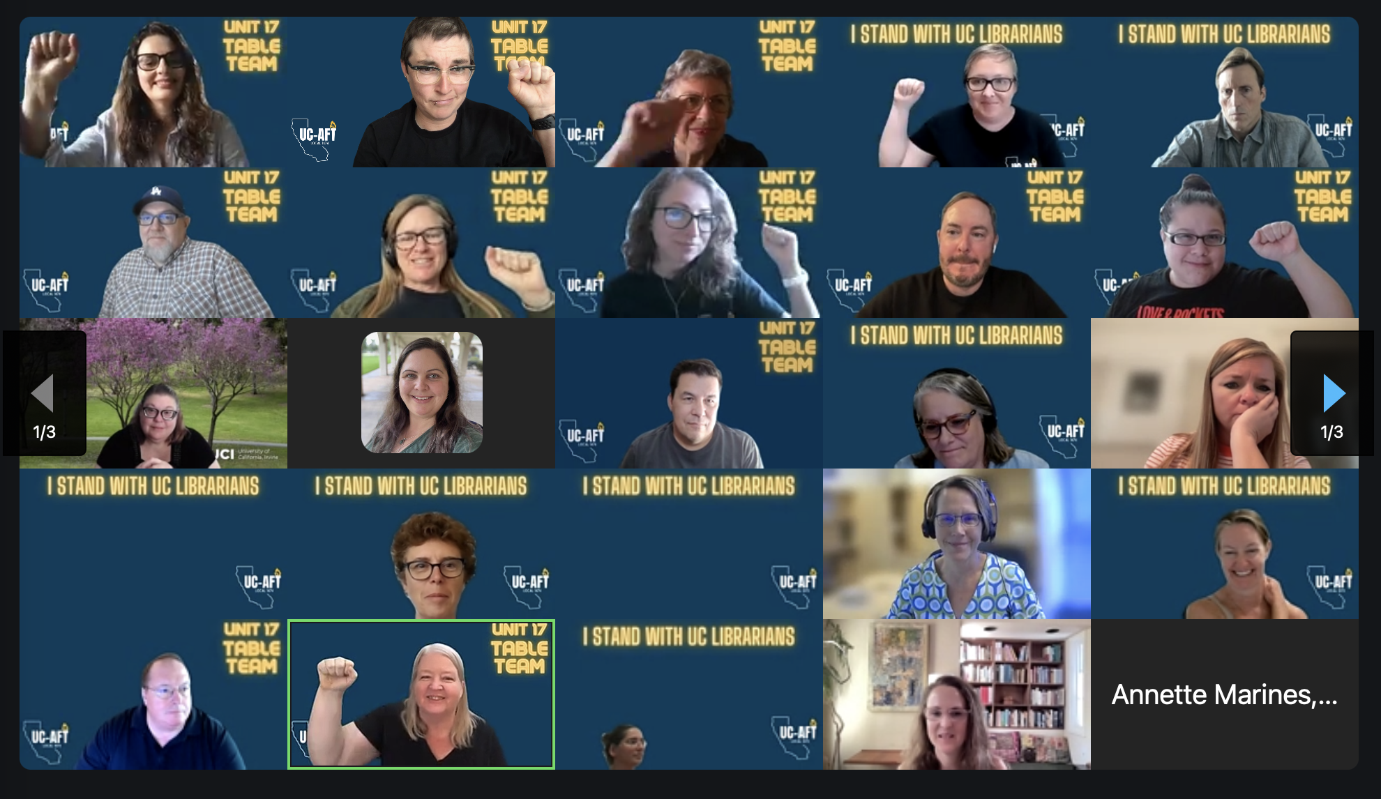 A Zoom call screenshot featuring 20 people arranged in a grid pattern. Each participant holds a fist in the air in a gesture of solidarity. The background for each person displays supportive text, such as 'I Stand with UC Librarians' and 'Unit 17 Table Team.'